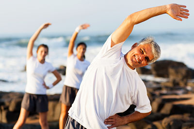 This is a picture of three people doing yoga.