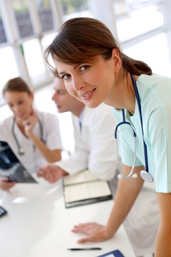 This is a picture of two nurses and a doctor.